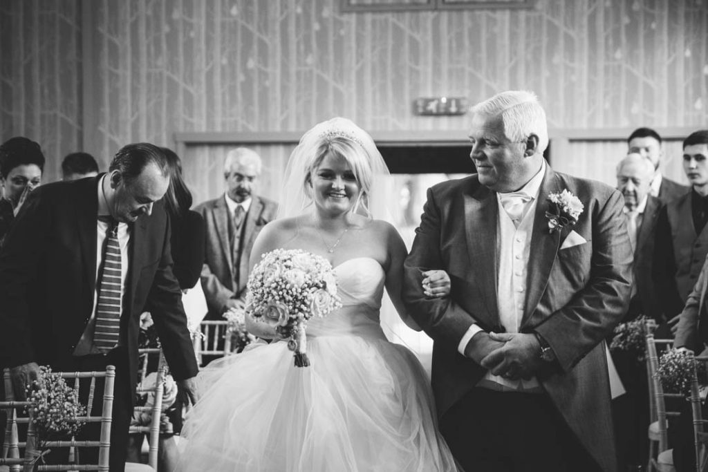 Bride walking down the aisle with her Father