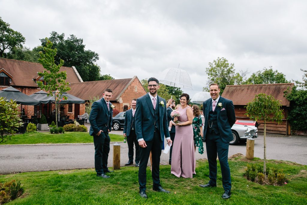 Guests laughing at Nuthurst Grange wedding