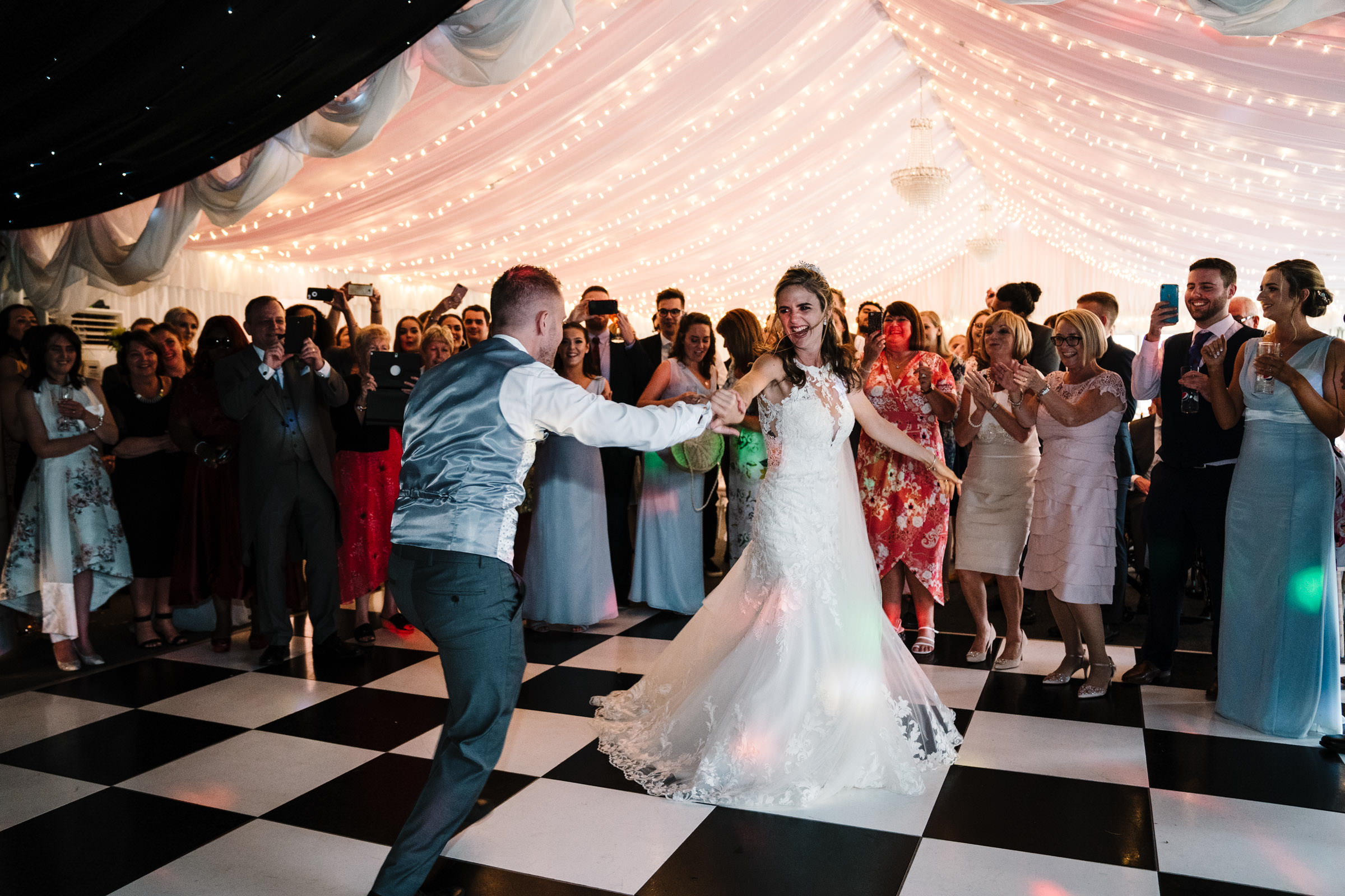 bride and groom first dance, marquee at ashton lodge