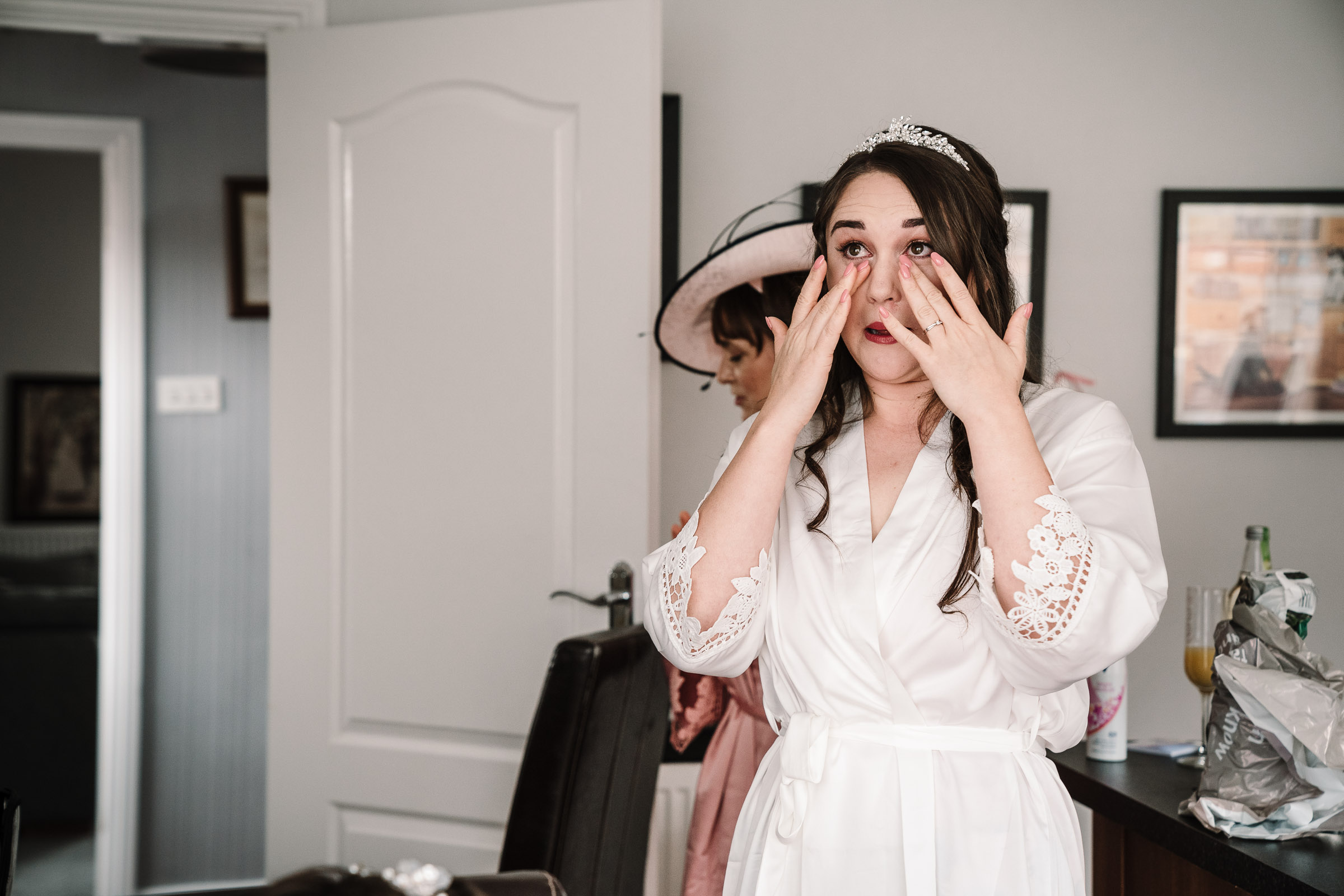 emotional bride as she gets ready for her wedding